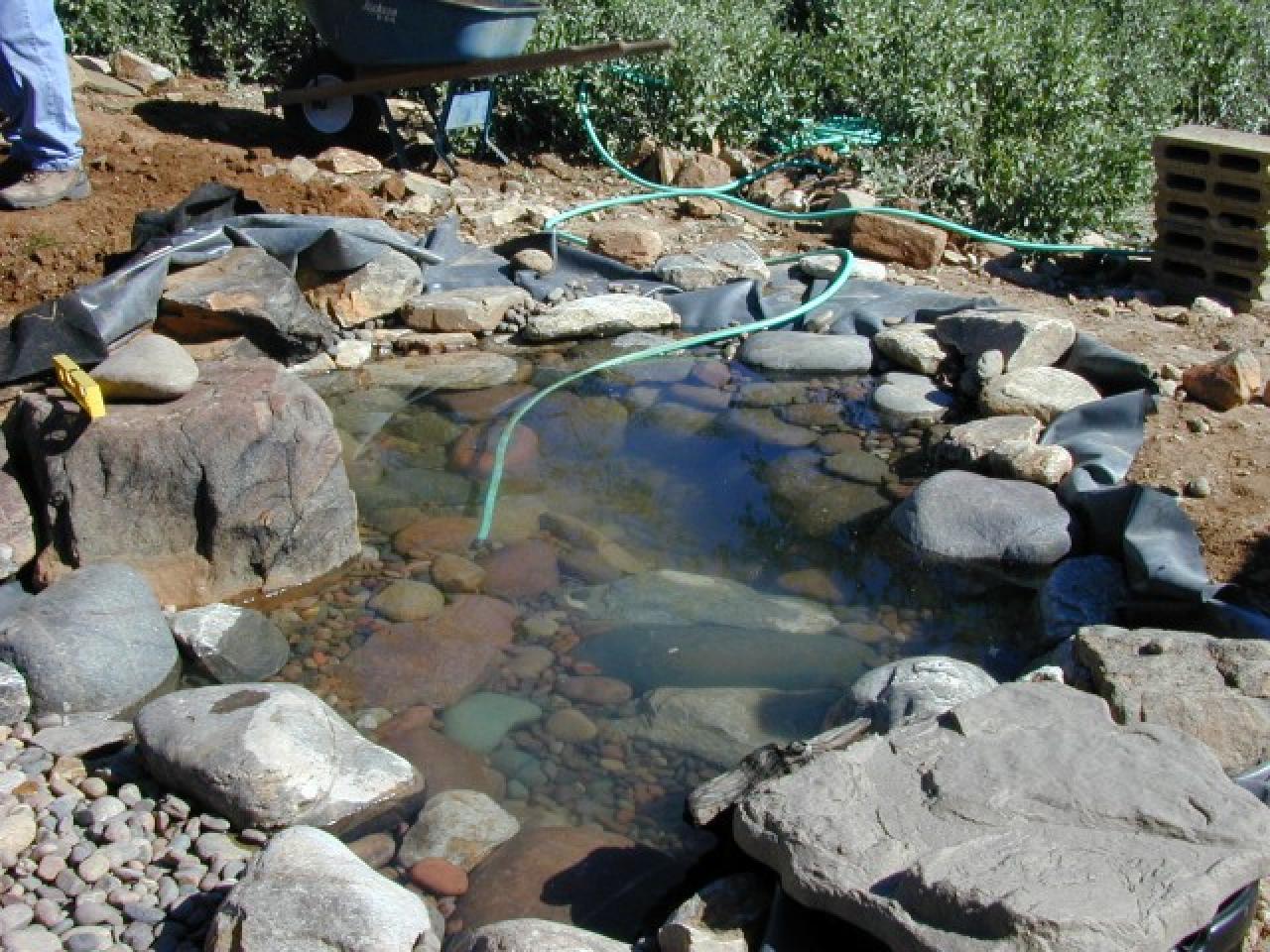 How to Create a Pond and Stream for an Outdoor Waterfall ...