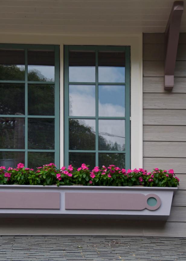 Home With Pretty Window Boxes Home With Pretty Window Boxes