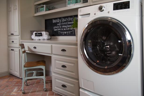 Fun and Functional Neutral Laundry Room with Red Brick Floors