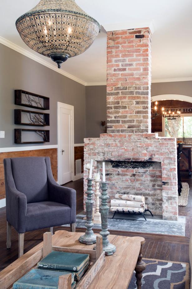 Uncovered Gem Brick Fireplace in a Gray Living Room