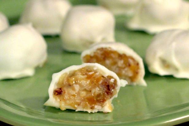 Sweet potato bon bons combine dried fruits and pecans with the sweet succulence of seasonal sweet potatoes. Sweet potato bon bons combine dried fruits and pecans with the sweet succulence of seasonal sweet potatoes.