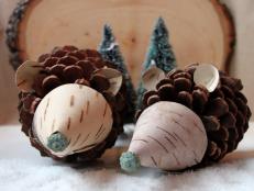 Add a touch of whimsy to your holiday decor with these pinecone hedgehogs crafted entirely from natural materials.