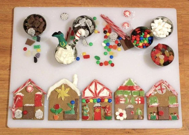 Kids can decorate these individual gingerbread house cookies as a DIY party favor this holiday season.