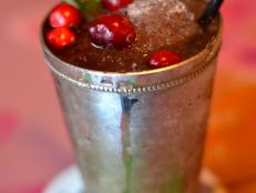 Don’t you think Santa wants to put his big black boots up for a second and sip a <a href="http://www.hgtvgardens.com/recipes/a-christmas-mint-julep" target="_blank">Jingle Julep</a>? The cranberry and rosemary-infused simple syrup adds a rich herby flavor.&nbsp;