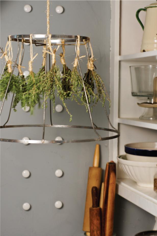 Hang your herb drying rack in the kitchen for easy access to home grown herbs long after the growing season ends. Hang your herb drying rack in the kitchen for easy access to home grown herbs long after the growing season ends.