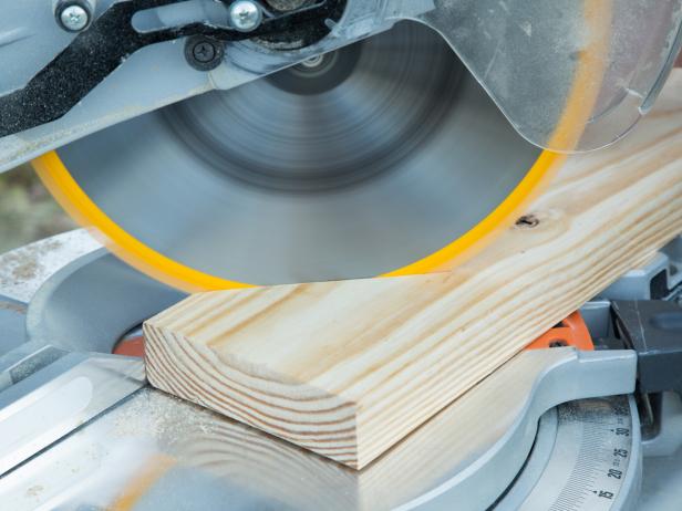 Create four corner braces from planks of 2' x 8' pine or cedar by cutting each plank at a 45 degree angle with the circular saw.
