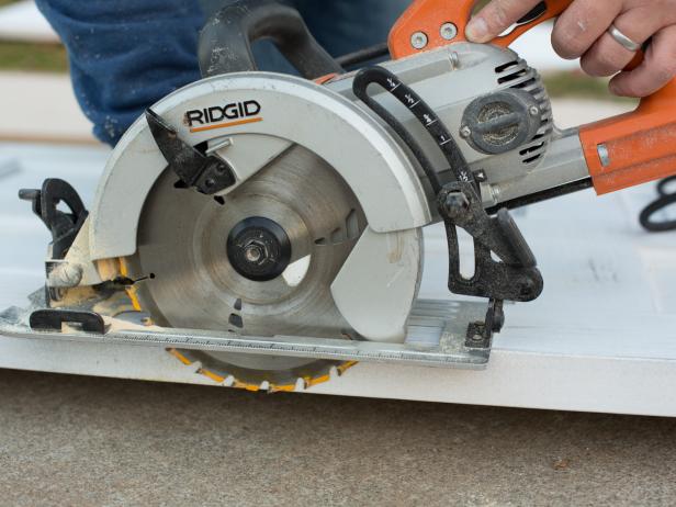 In order to make the arbor open and airy, cut openings into the tops of each of the doors. Doors with recessed panels simply require cutting around the inside edge of the paneling using a circular saw. When using solid wood doors without paneling, measure and mark the intended opening size with measuring tape and pencil, then cut with circular saw. Tip: Standard exterior entry doors are 36” wide. An excellent size opening based on proper scale and proportion of two doors placed across from one another is 24”, leaving approximately 6” of door on each side of the opening.