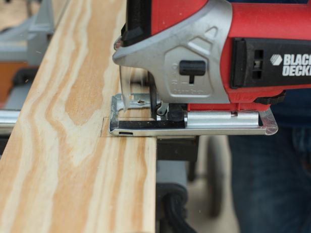 Cut a notch in the wood using a jigsaw.