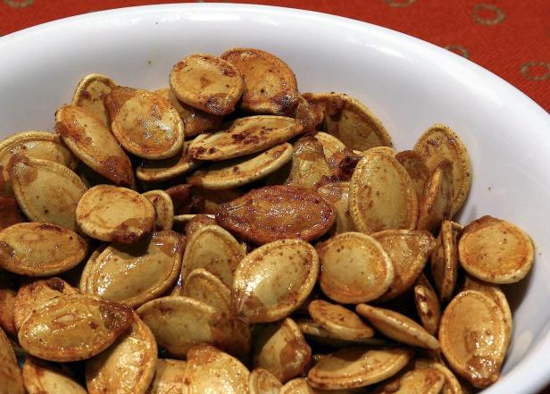 Toss pumpkin seeds in your favorite spices to put a new spin on a fall favorite. Toss pumpkin seeds in your favorite spices to put a new spin on a fall favorite.