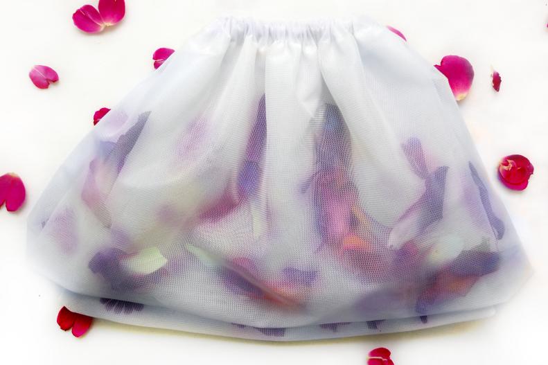 Little flower girls are sure to love this bright, floral skirt on the day of the wedding, and many days after. Bright petals float in layers of tulle for that are perfect for twirling in. As a bonus, this skirt is simple to make, even if you are new to sewing.