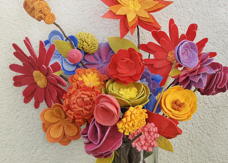 Spring is coming soon, but if you just can't wait to add those bright floral colors to your home, try making some beautiful felt flowers. They make stunning arrangements, wreaths and decorations and they can be made in any color you like so you can match the decor or your mood perfectly!