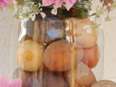 This beautiful Easter egg vase is made with recycled glass jars and naturally dyed Easter eggs. Each dye is quick and easy to make with fruits, fruit juice and spices you probably have around the house! And after Easter you can repurpose your beautiful vase to use all year round.