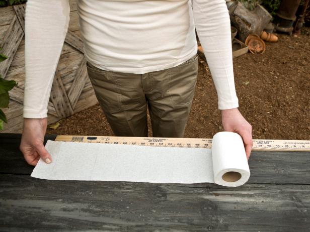 Start by measuring out a length of toilet paper.