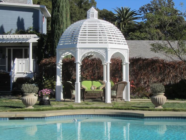Colonial-style posts rise to arches with latticework in this stunning gazebo by <a target="_blank" href="http://www.samsgazebo.com">SamsGazebos</a>, available at Costco and also sold at Home Depot. $2,999-$3,499