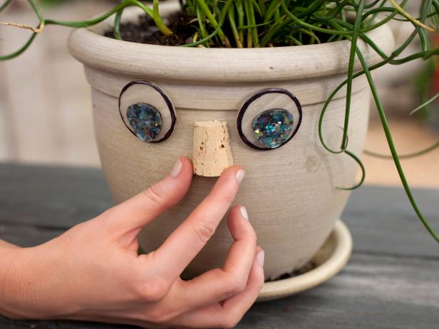 Split a cork lengthwise to create a "nose". 