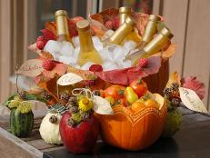 Grab a couple of pumpkins, gourds, crisp fall apples and lots of beautifully colored leaves to make these beautiful bowls and name card holders for your next fall party. A big pumpkin bowl is great for serving cold drinks, and you can use a smaller pumpkin for dip, veggies or anything else!