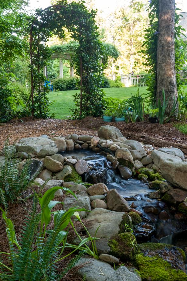 The owners of this Georgia garden have invested in water features and structures, such as pergolas and arbors, to make their yard a showcase. They have selected most of the plants for their property, which encompasses 12 acres and shows how you can design an expansive garden for $50,000 or less. The home was on the garden tour during the 2015&nbsp;<a href="http://www.celebratedouglascounty.com/view/programs/view_prog/&amp;cdept=408&amp;department=Penny%20McHenry%20Hydrangea%20Festival" target="_blank">Penny McHenry Hydrangea Festival</a>, an annual event in Douglas County, Ga.