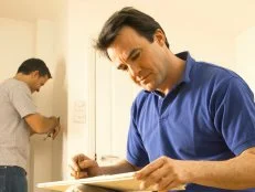 Men doing home improvement