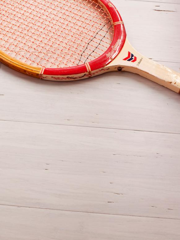 White Bamboo Flooring and Tennis Racket White Bamboo Flooring and Tennis Racket