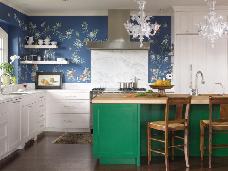 Kitchen With White Cabinets, Blue Wallpaper and Green Island