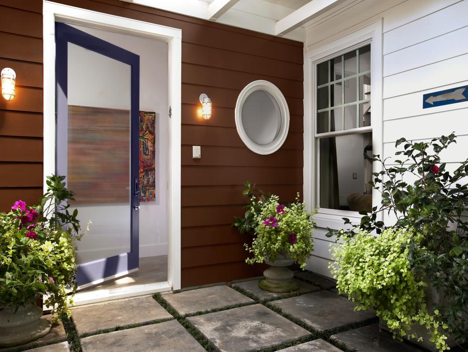 front door entry using fake grass around pavers