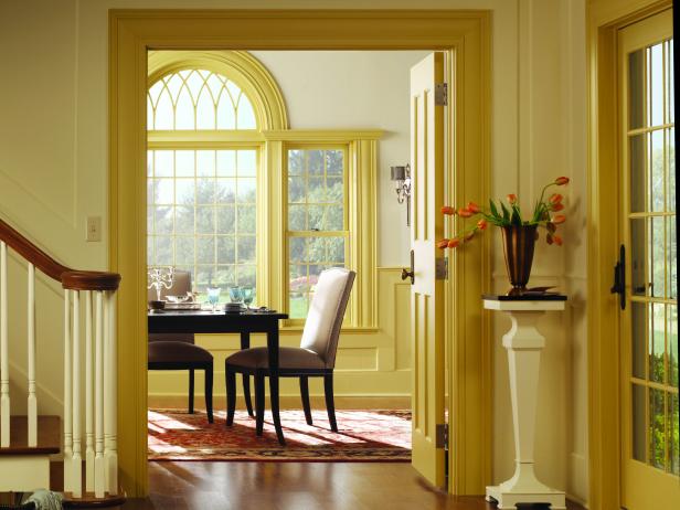 Traditional Yellow Foyer and Dining Room With Large Window Traditional Yellow Foyer and Dining Room With Large Window