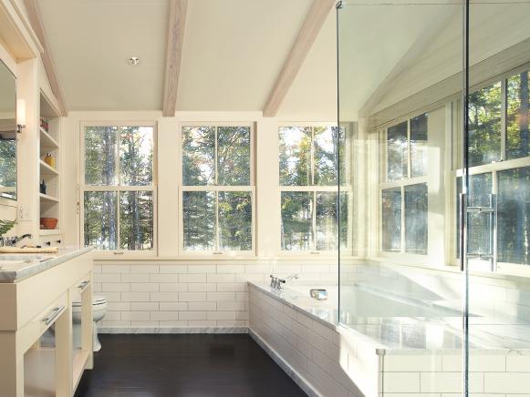 Green Bathroom With Soaking Tub & Exposed Beams