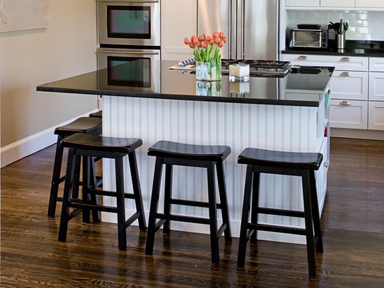 kitchen island with lower breakfast bar