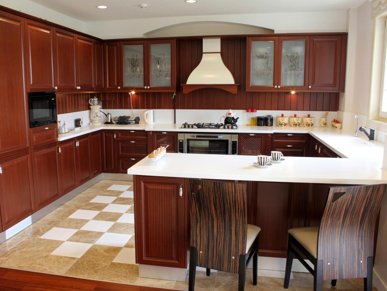 wall of tall cabinet in u shaped kitchen