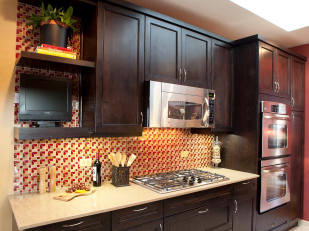 Restaining Kitchen Cabinets: Pictures, Options, Tips & Ideas HGTV Dark Wood Kitchen Cabinets With Patterned Backsplash - Restaining Kitchen Cabinets: Pictures, Options, Tips & Ideas HGTV