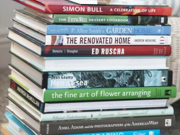 Stack of Books on a Plant Stand.