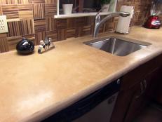 Countertop and backsplash after kitchen transformation as seen on DIY Network's Kitchen Impossible.