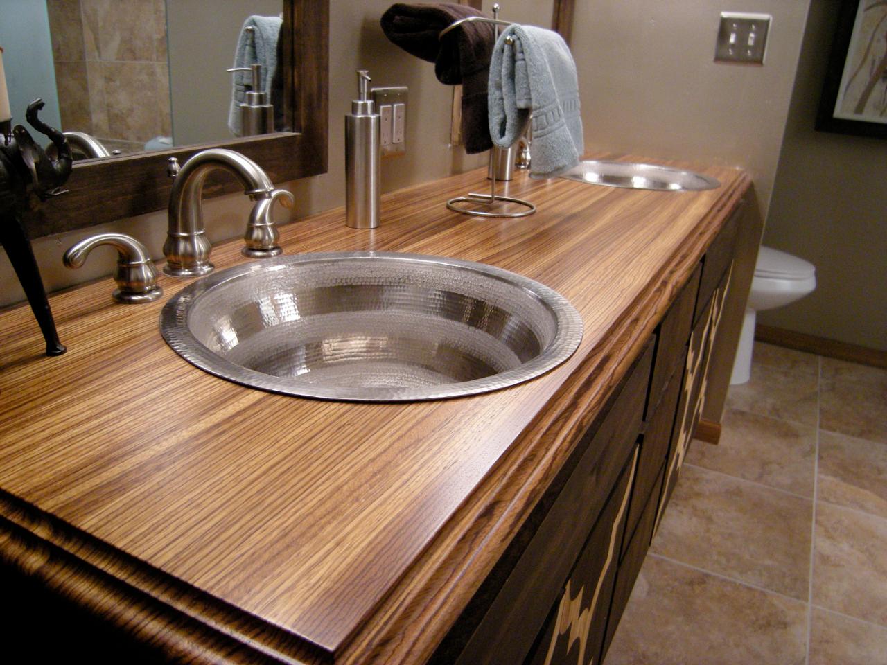 Steel vanity sinks in wood top