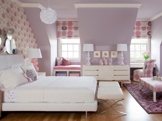 We all know pink is the ultimate girl color â   nothing else can give a room a feminine touch like this blushing hue. That's what makes it the perfect choice for a girl's bedroom. Highlighting different shades in a floral fabric and pairing it with purple only intensifies its playful appeal.