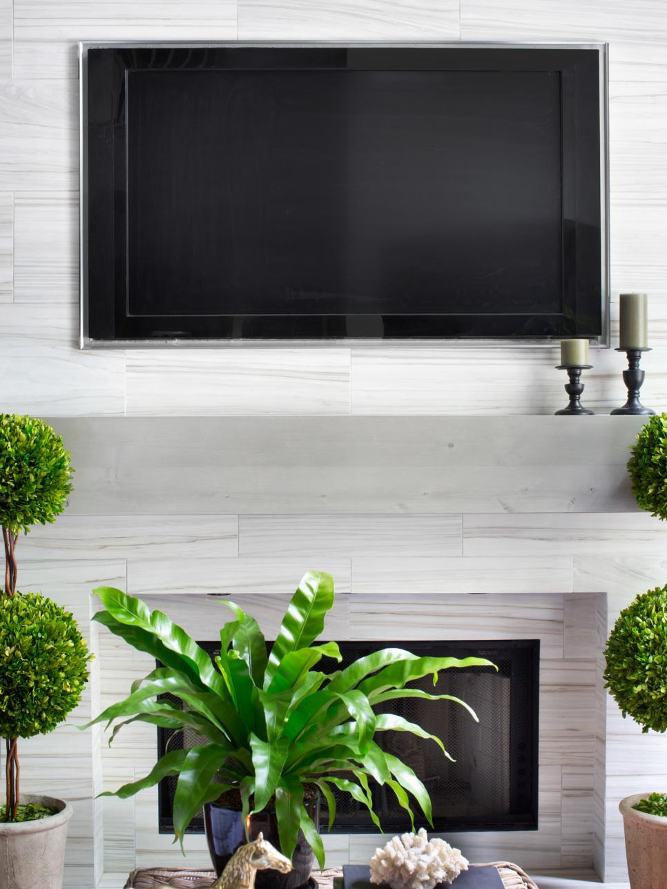 Should a TV be mounted over a fireplace?
