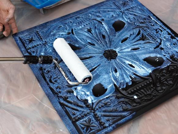 ODOC_house_counselor_install_faux_tin_ceiling_apply_cement_to_tile_close_up_001_h ODOC_house_counselor_install_faux_tin_ceiling_apply_cement_to_tile_close_up_001_h