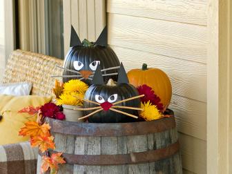 Welcome trick-or-treaters with a litter of black cat pumpkins near your front door. They're easy to create, and you can display them for years to come!