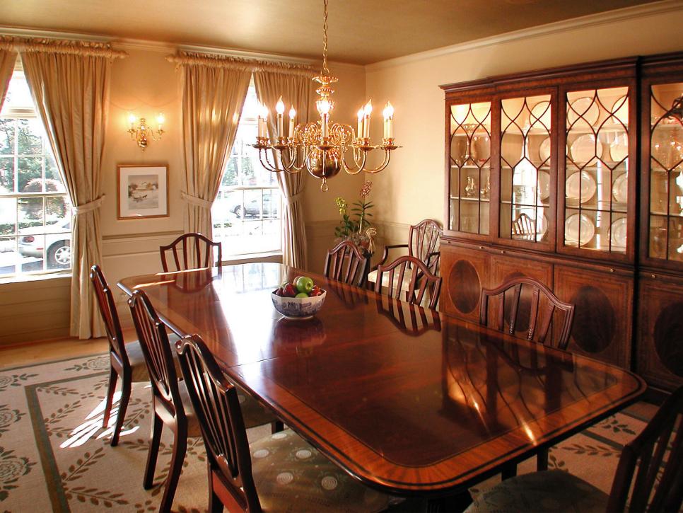 Traditional Dining Room With Dark Wood Dining Table and China Cabinet