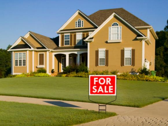 Neutral Home Exterior With "For Sale" Sign Neutral Home Exterior With "For Sale" Sign
