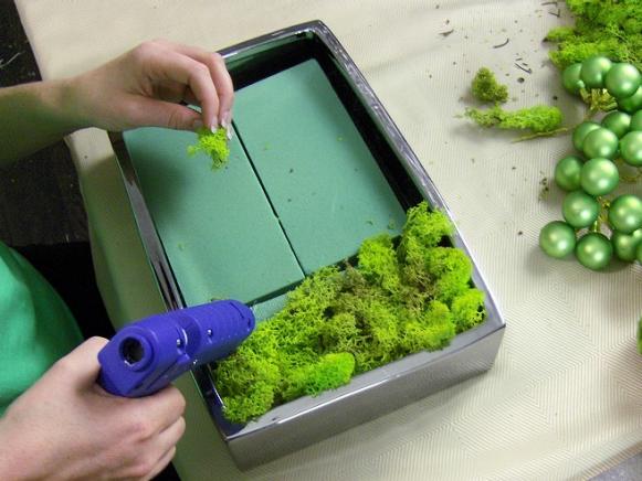 Gluing Moss on Bricks