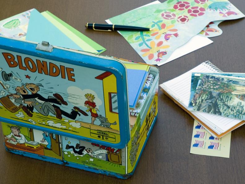 Colorful Vintage Lunch Box Holding Cards and Envelopes