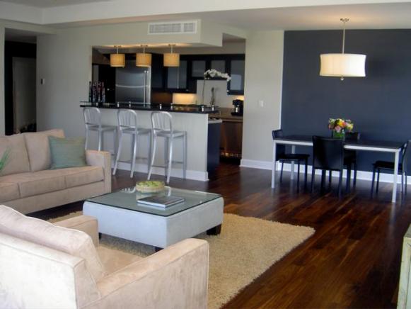 Black and White Open Plan Kitchen and Living Area With White Sofa Black and White Open Plan Kitchen and Living Area With White Sofa