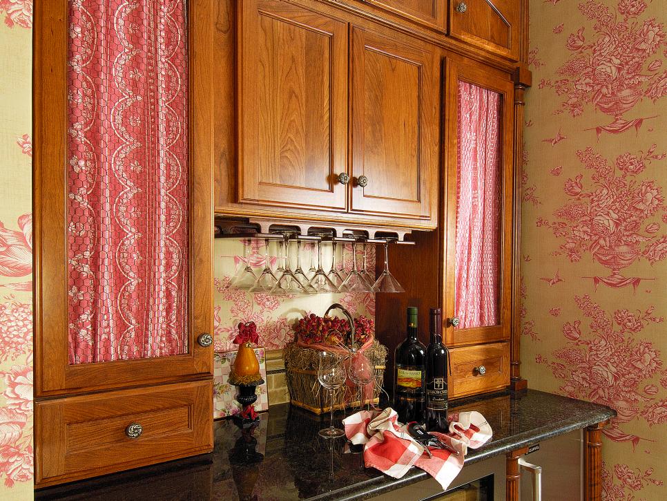 Built-in cabinets with toile wallpaper