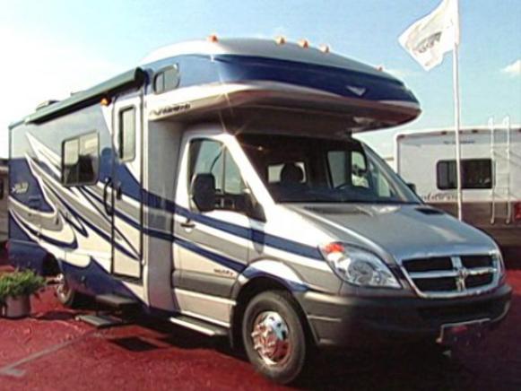 Motor Home With Blue And Silver Detailing