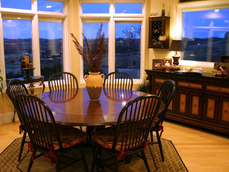 Traditional Dining Room With Bay Window and Buffet