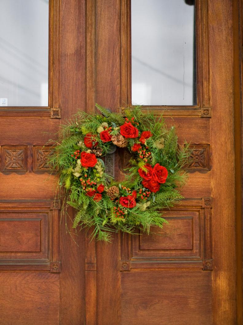 Holiday Wreath With Greenery and Red Roses