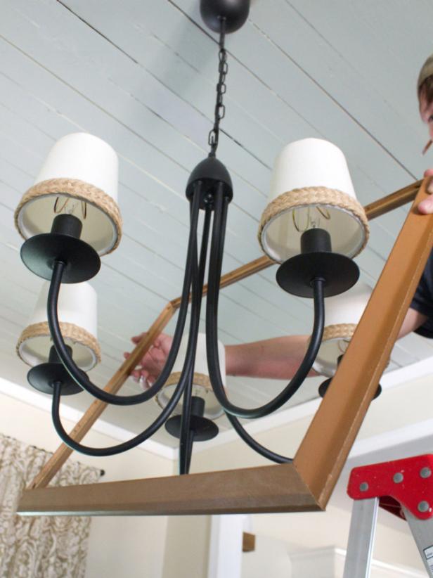 Wrought Iron Chandelier and Wooden Frame Wrought Iron Chandelier and Wooden Frame