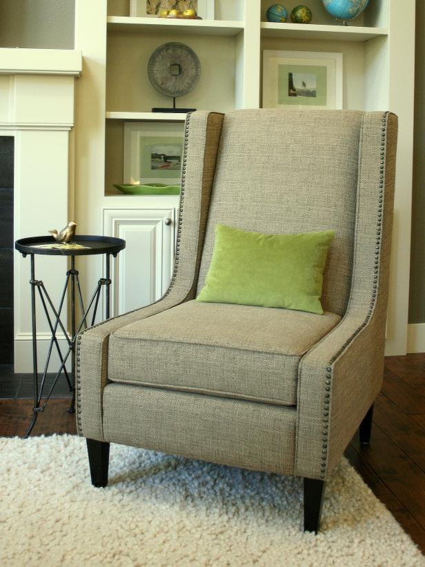 Green Pillow on Transitional Neutral Chair With Nailhead Trim