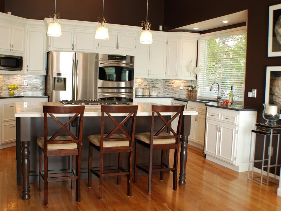 Brown and White Traditional Kitchen With Stainless Steel Appliances