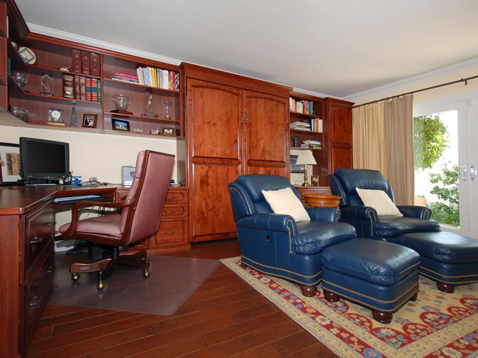 Stained Wood Home Office With Plush Blue Leather Chairs